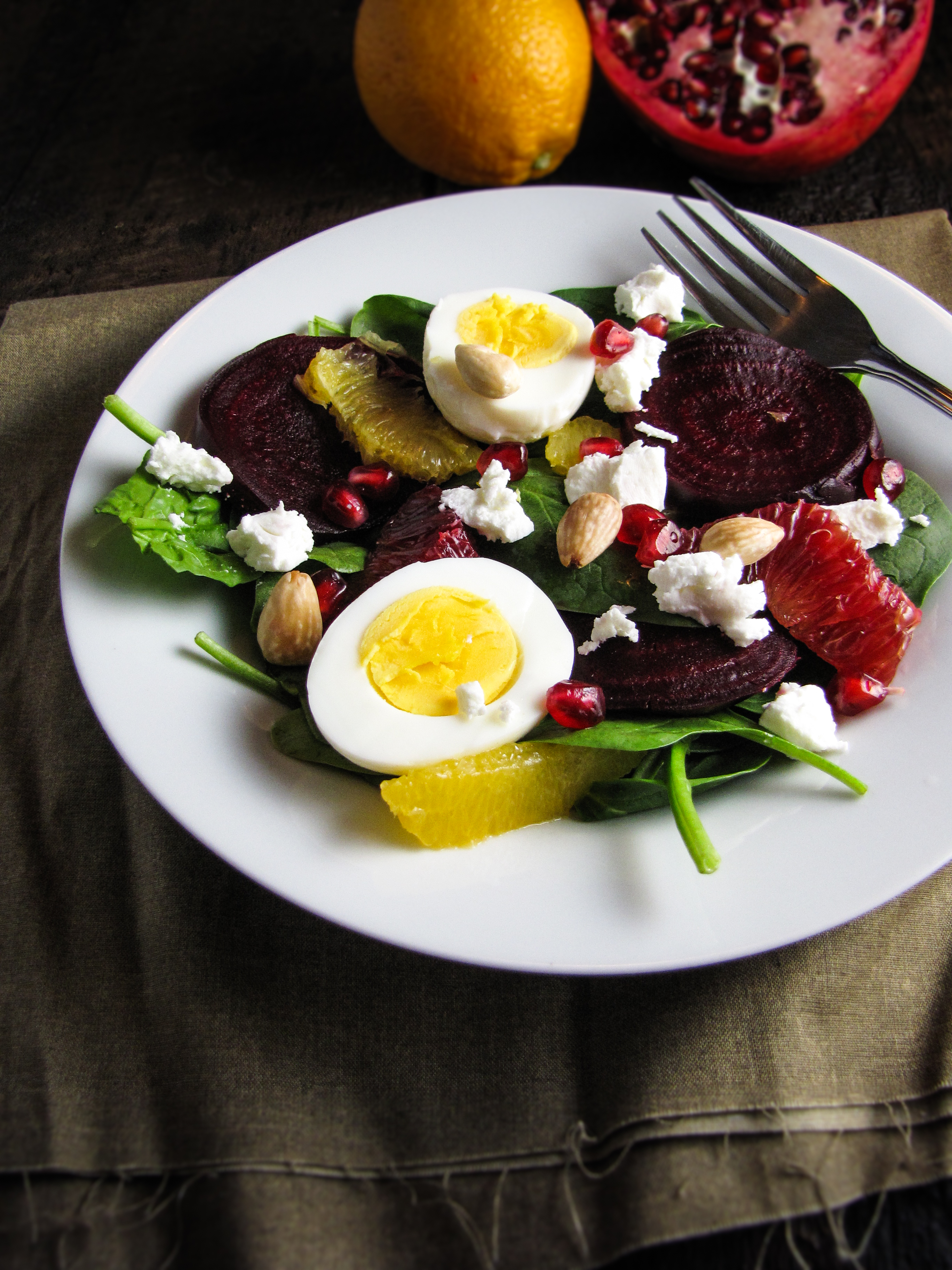 Roasted Beet and Spinach Salad with Eggs, Goat Cheese, Pomegranate, and Orange {Katie at the Kitchen Door}