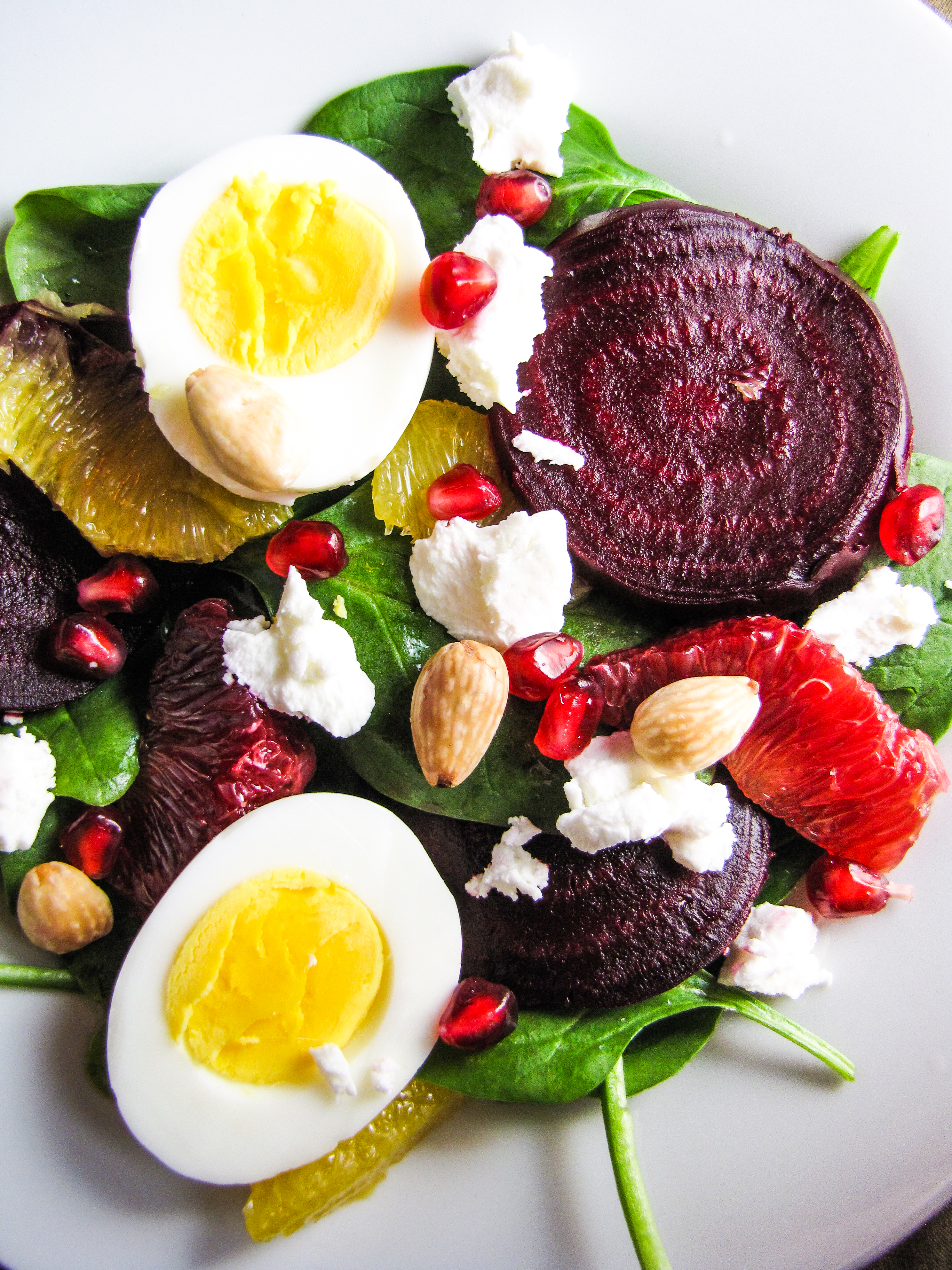 Roasted Beet and Spinach Salad with Eggs, Goat Cheese, Pomegranate, and Orange {Katie at the Kitchen Door}