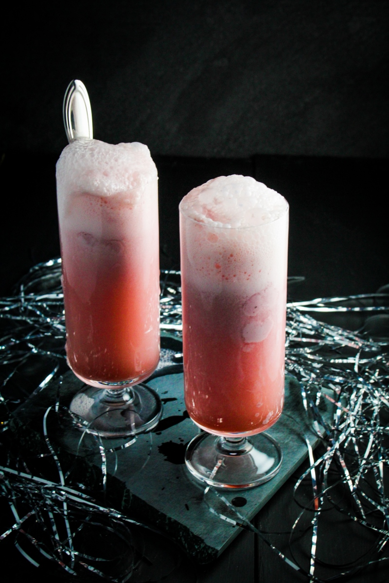 12 Festive Winter Cocktails  - Raspberry Sherbet Champagne Floats | Happy New Year! {Katie at the Kitchen Door}