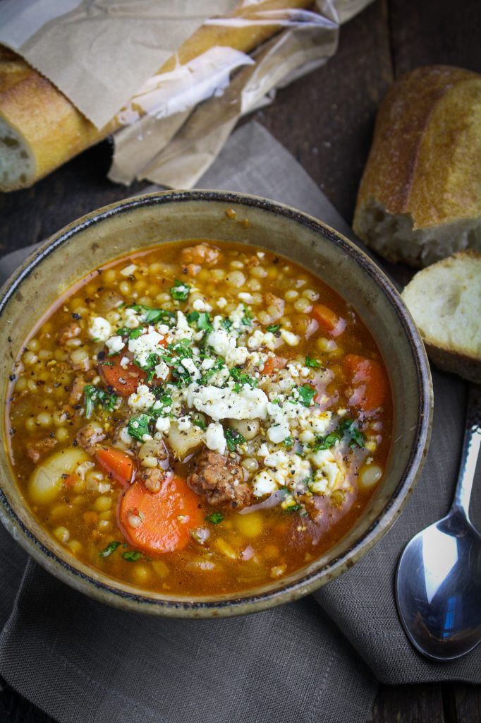 Spicy Chorizo Soup with Israeli Couscous and Mole Sauce {Katie at the Kitchen Door}