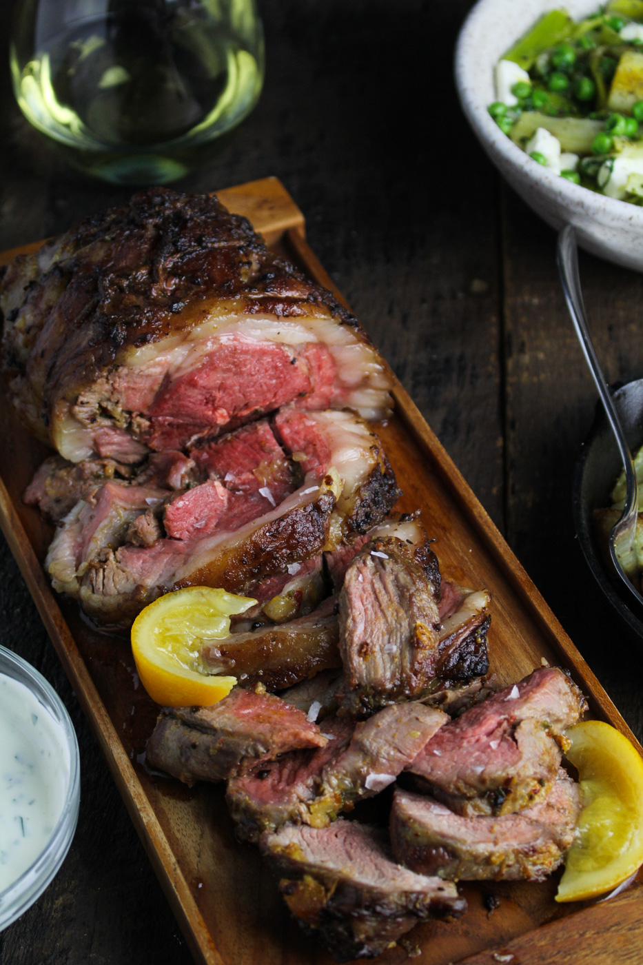 Boneless Leg of Lamb with Preserved Lemon, Harissa, and Rosemary Butter - Sunday Dinner: Easter Edition {Katie at the Kitchen Door}